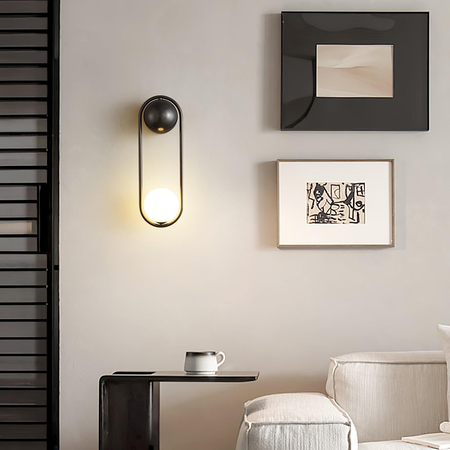 Wall Lamp with Brass Loop Frame and Glass Globe