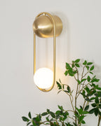 Wall Lamp with Brass Loop Frame and Glass Globe