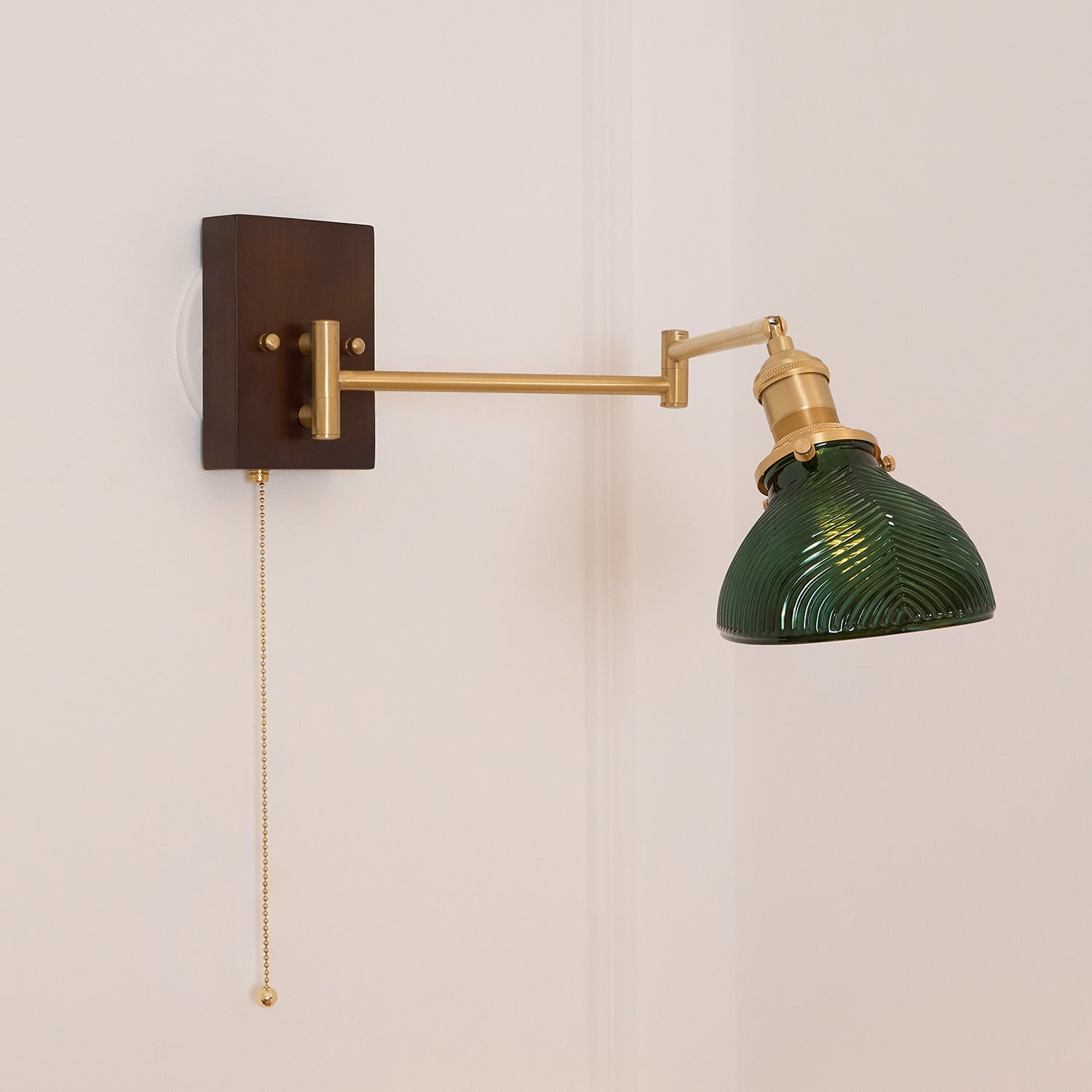 Emeric Adjustable Swing Arm Wall Lamp with Green Glass Shade