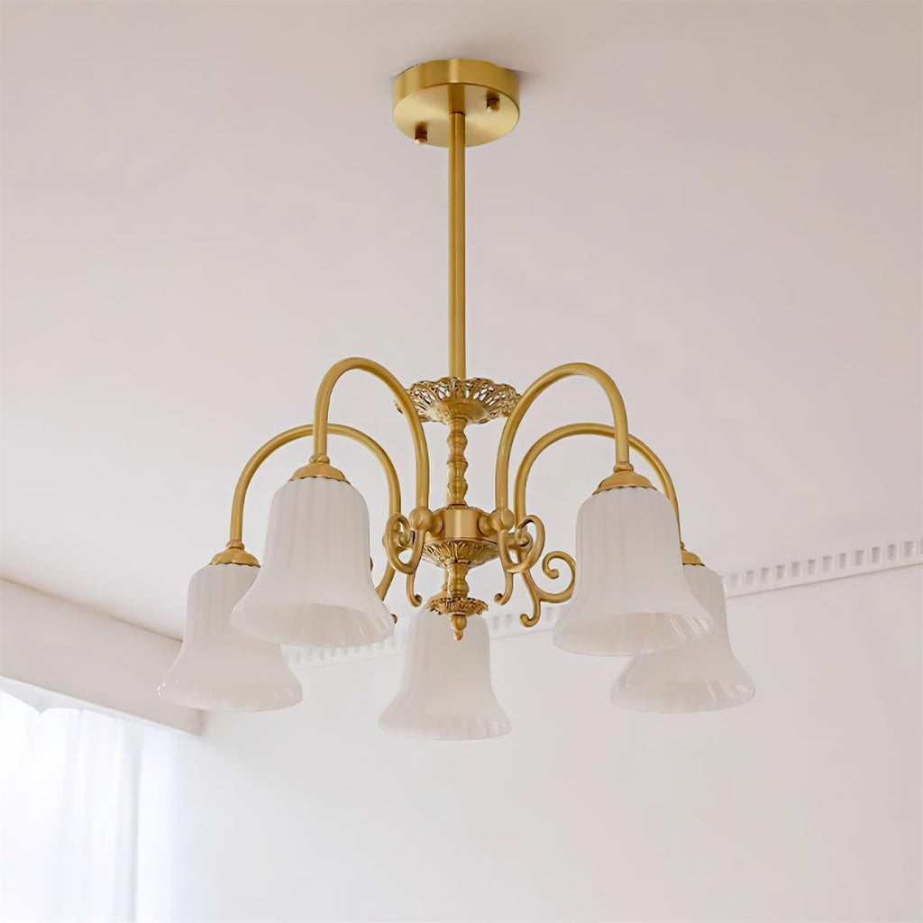 Chandelier with Brass Arms White Glass Shades Opulent Luxe