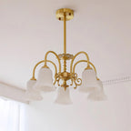 Chandelier with Brass Arms White Glass Shades Opulent Luxe