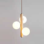 Orbitra Vertical Pendant Lamp Travertine & Glass