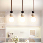 Ullaeia Sphere-Cluster Travertine Pendant Light