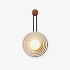 Isoror Spiral-Ring Travertine Wall Light