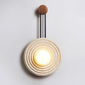 Isoror Spiral-Ring Travertine Wall Light
