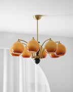 Chandelier Glass Shades Metal Frame Wood Accents Mid-Century Calm