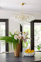 Aurora Chandelier Clear Glass Globe Aged Brass Elegant