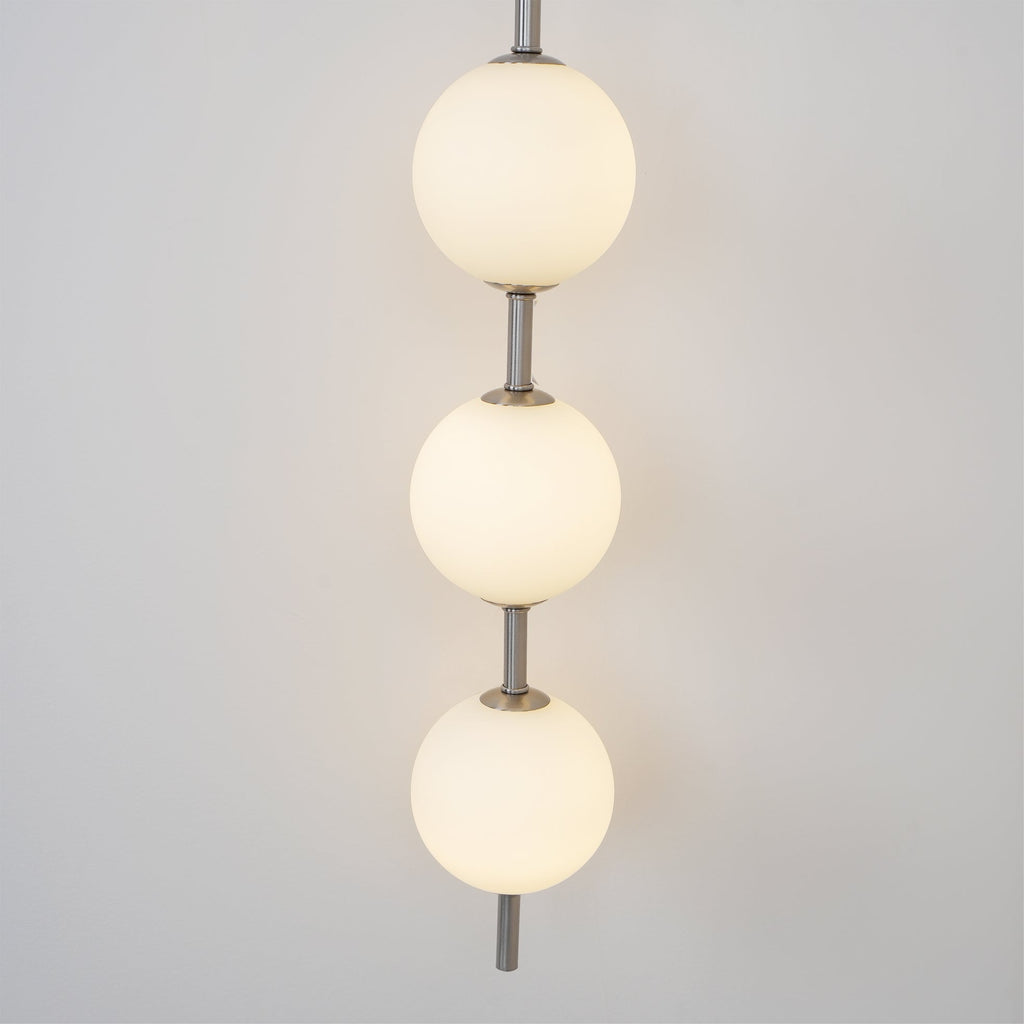 Cerin Vertical Globe Wall Lamp