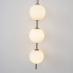 Cerin Vertical Globe Wall Lamp