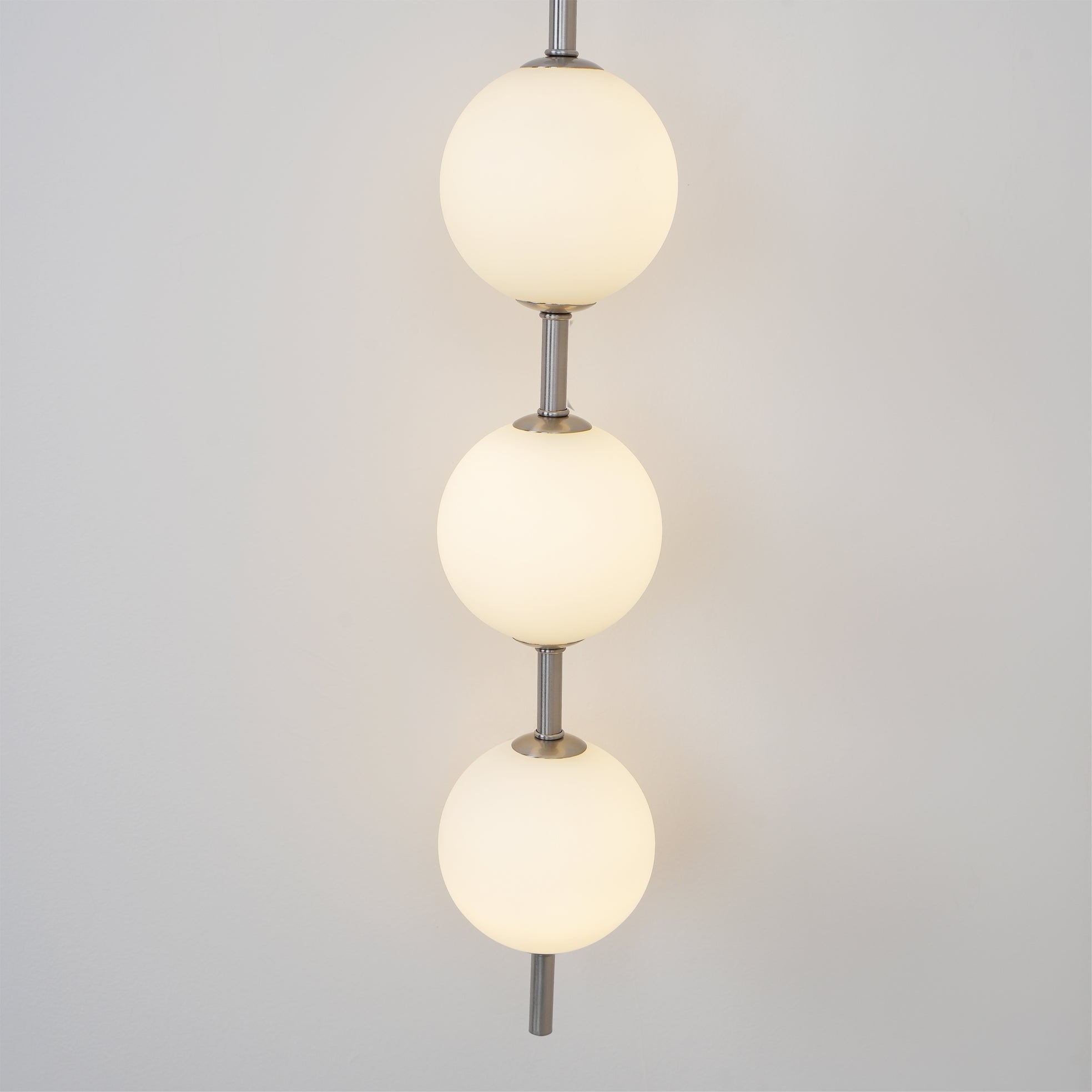 Cerin Vertical Globe Wall Lamp
