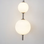 Cerin Vertical Globe Wall Lamp